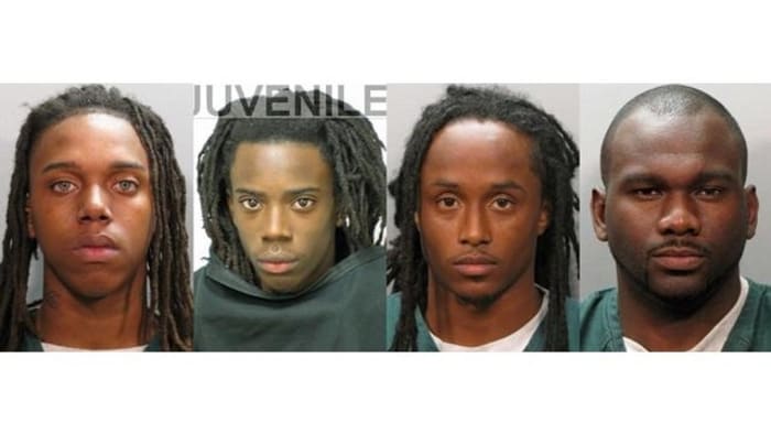 4 arrested in strip mall party killing