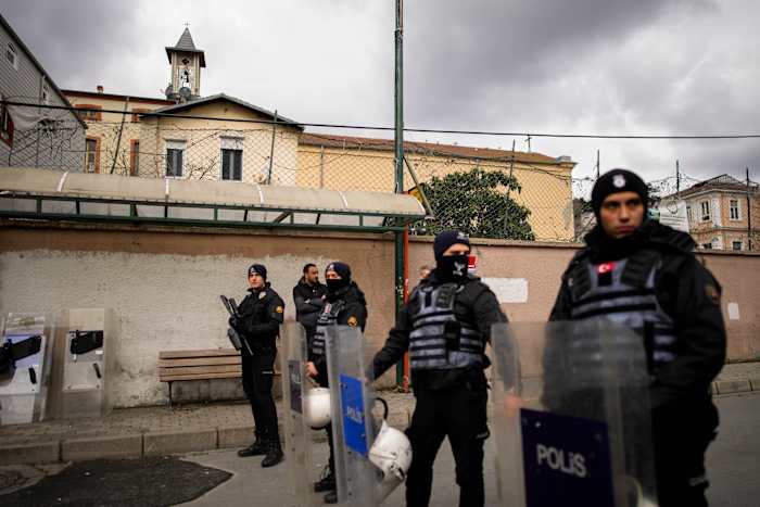 2 masked men kill a person in attack on Catholic church in Istanbul. Officials detain 2 ISIS members