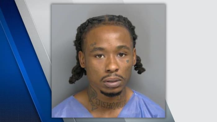 Man accused of shooting and injuring man, holding woman and her son hostage in Macomb County