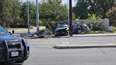 Driver dies in Mission Point rollover crash, van hits parked cars