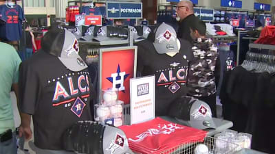 Houston Astros fans line up outside Academy to buy World Series