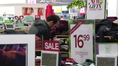 Virus keeps Black Friday crowds thin, shoppers shift online