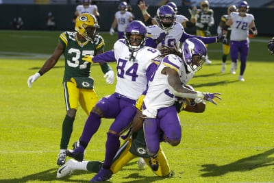 Vikings defeat Packers 28-22 behind four Cook touchdowns