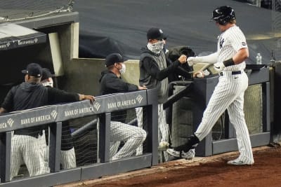 Kyle Higashioka drives a two-run home run to left