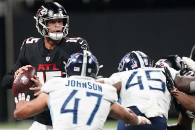 Woodside, Barkley throw TDs as Titans stop Falcons 23-3