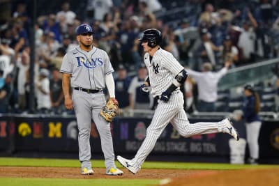 Walls tiebreaking grand slam lifts Rays over Yanks 8-7 for 4-game split