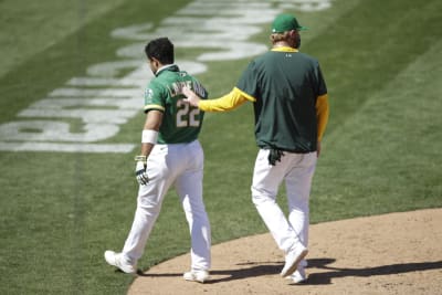 Matt Chapman of the Oakland Athletics sits in the dugout after