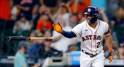 Houston Astros Jose Altuve (27) hits a two-run home run during the