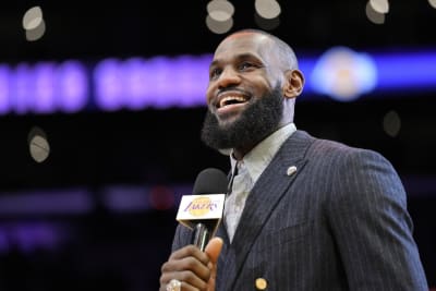 The names of Los Angeles Lakers' LeBron James' kids are written on his shoes  during an NBA basketball game against the Memphis Grizzlies Sunday, Dec. 23,  2018, in Los Angeles. (AP Photo/Marcio