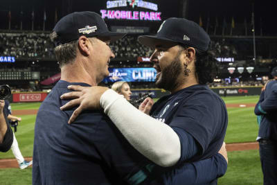 Ichiro Suzuki of the Seattle Mariners embraces manager Scott