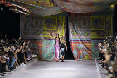 A model walks the runway at the Prada show during Milan Men's