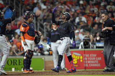 Houston Astros catcher Martin Maldonado (15) looks down to first