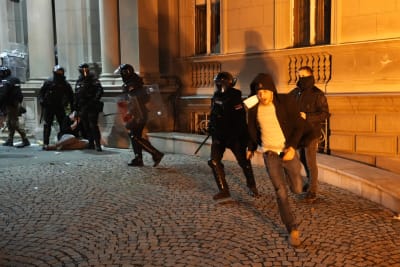 Serbian police fire tear gas at protesters threatening to storm