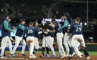 Crawford's slam, 10th-inning run lifts Mariners past Rays