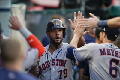 The Astros win 7-5 over the spiraling Angels