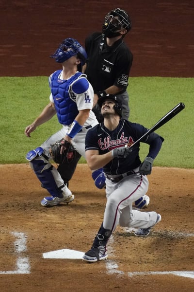 Atlanta Braves' Adam Duvall (14) swings in the second inning of a