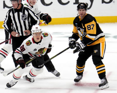 Bedard has assist in NHL debut, Blackhawks beat Crosby, Penguins 4