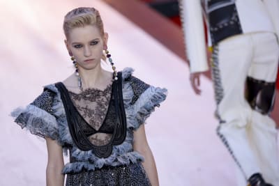 A model wears a creation as part of the Louis Vuitton Ready To