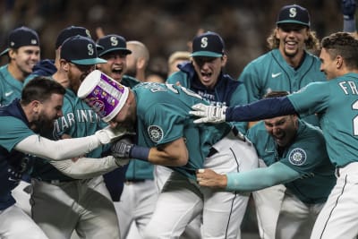 Denver, USA, 21st July 2021. July 1202021: Seattle first baseman Ty France  (23) makes a play during the game with the Seattle Mariners and the  Colorado Rockies held at Coors Field in