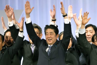 Japan PM purges Cabinet after support falls over church ties