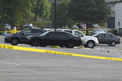 Parking lot party shooting leaves 1 dead and at least 22 people