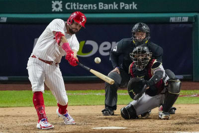 Chicago Cubs catcher and designated hitter KYLE SCHWARBER hits a single