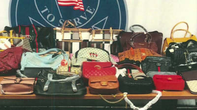 Michigan police confiscate 700 fake designer handbags in undercover bust 