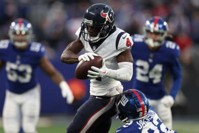 Jones, Barkley lead Giants past Texans 24-16 for 7-2 start