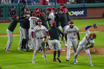 Members of the Philadelphia Phillies celebrate in the locker room