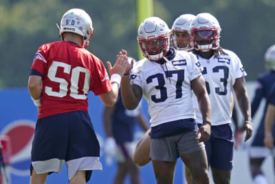 Why is QB Mac Jones wearing No. 50 during Patriots training camp?