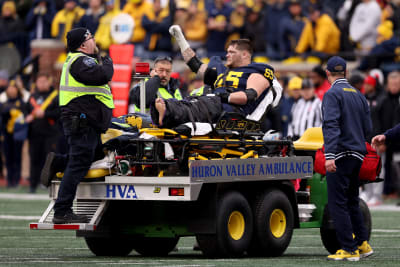 From devastated to unified': How Michigan fans galvanized team after Zak  Zinter injury