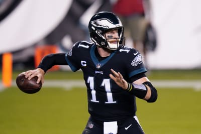 AP source: Eagles send Carson Wentz to Colts for draft picks