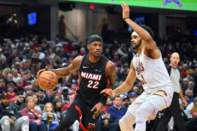 Devin Booker scores 23 in return, Suns roll past Heat to clinch playoff  spot