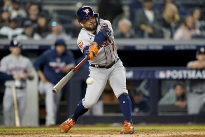 Astros' Jose Altuve nicked by pitch, stars booed in spring training