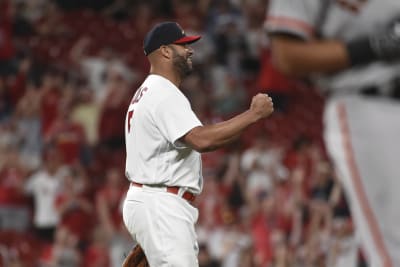 Anything you can do': A week after Pujols did it, Yadi makes first-career  pitching appearance for Cardinals