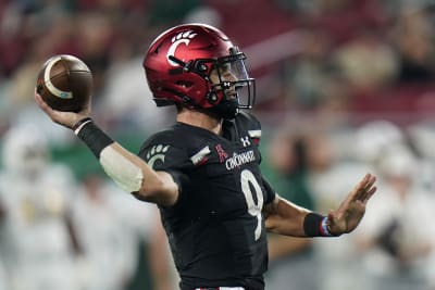 Ridder breaks Cincinnati TD record, No. 2 Bearcats beat USF