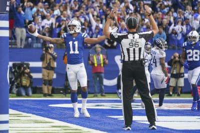 Indianapolis Colts' Ashton Dulin (16) celebrates a touchdown reception  during the first half of …