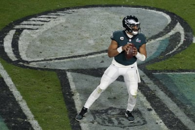 Download Jalen Hurts of the Philadelphia Eagles Drops Back to Pass