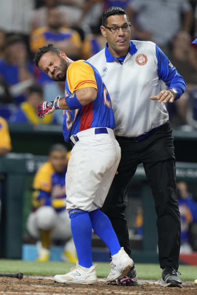 Astros' Altuve leaves WBC game after hit on hand by a pitch