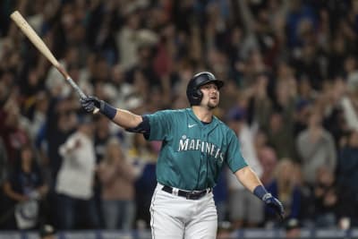 PHOTOS: Seattle Mariners Catcher Cal Raleigh Raises The 12 Flag