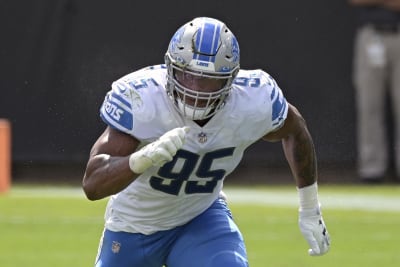 Lions' DJ Chark now wearing walking boot, vows to play again this season 