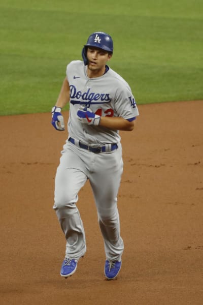 Dodgers set NL homer mark for month at 57, beat Rangers 7-2