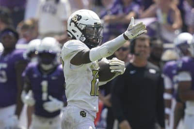 Coach Prime debuts new white and gold uniforms in Colorado debut