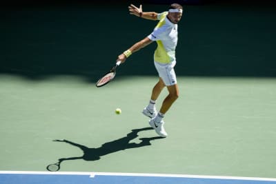 US Open: John Isner ends career in fifth set tiebreak