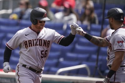 Athletics acquire Yan Gomes, Josh Harrison from Nationals