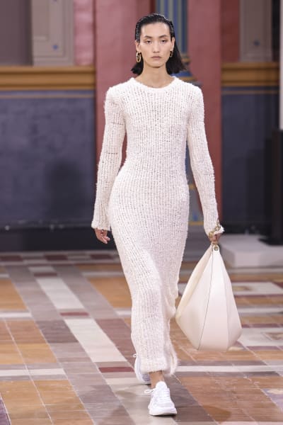 Valentino returns to Paris' Les Beaux-Arts with modern twist; Burton bids  farewell at McQueen