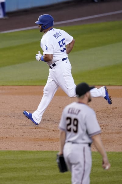 Pujols hits 1st homer with Dodgers and 668th of his career in win