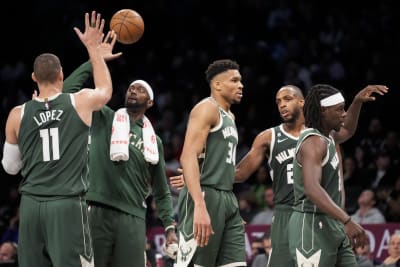 Bucks begin title defense with 127-104 victory over Nets