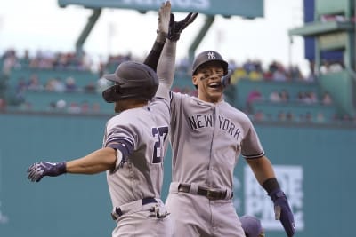 New York Yankees' Giancarlo Stanton runs the bases after hitting a two-run  home run off Boston Red Sox starting pitcher Nick Pivetta in the sixth  inning of a baseball game, Saturday, April