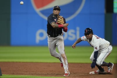 Braves' Orlando Arcia exits after being hit on the wrist with fastball